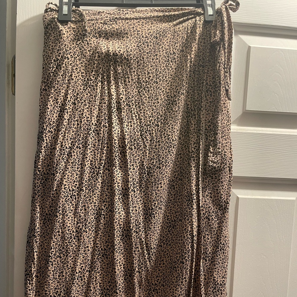 Tan and black tie skirt. Two ties with open slit on the left side